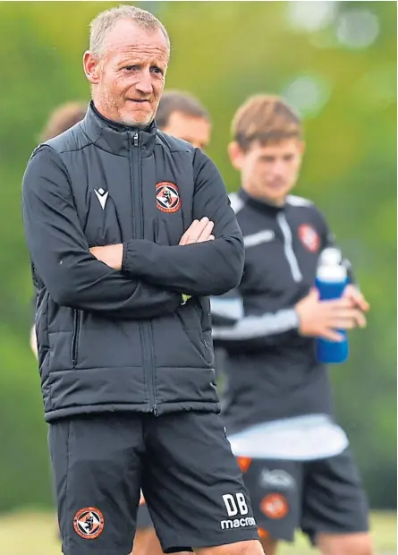  ?? Pictures: SNS Group. ?? Above: United boss Micky Mellon and coach Dave Bowman watch Saturday’s friendly with Motherwell at Dalziel Park; right: Connor Goldson, who Mellon helped develop at Shrewsbury before the defender’s big-money move to Brighton.