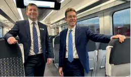  ?? Andy Coward ?? West Midlands Railway managing director Ian Mcconnell and West Midlands Mayor Andy Street on board 730018 during a preview trip between Wolverhamp­ton and Walsall on February 8.