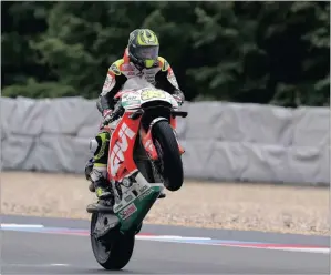  ?? PICTURE: AP PHOTO ?? Cal Crutchlow wheelies his LCR Honda after winning in Brno.