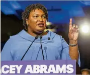  ?? ALYSSA POINTER / ALYSSA.POINTER@AJC.COM ?? Gubernator­ial candidate Stacey Abrams speaks to supporters during her election night watch party at the Hyatt Regency in Atlanta.