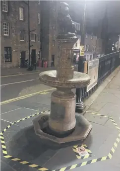  ??  ?? Warning tape round Greyfriars Bobby has been removed
