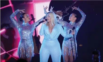  ?? ?? Bebe Rexha performs in Cap d'Antibes, France, last month. Photograph: Andreas Rentz/amfAR/Getty Images for amfAR