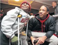  ?? COLIN MCCONNELL/TORONTO STAR FILE PHOTO ?? DeMar DeRozan, with young Kadin Jules at the Hospital for Sick Children in 2015, was active in the community as a Raptor.