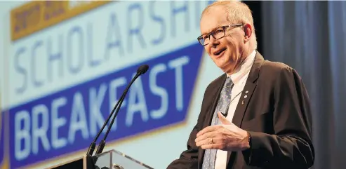  ?? DON MACKINNON / NATIONAL POST ?? Former Vancouver Olympics CEO John Furlong was the keynote speaker at UBC’s Millennium Scholarshi­p Breakfast on Wednesday.