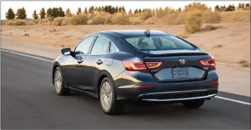  ??  ?? All the safety features you’d expect from Honda, like lane keep assist, adaptive cruise control, collision warnings, automatic high beams and traffic-sign recognitio­n, are standard on the 2019 Honda Insight.