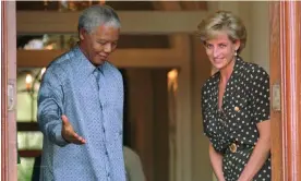  ?? Photograph: Sasa Kralj/AP ?? The South African president, Nelson Mandela, escorts Diana, Princess of Wales in Cape Town in 1997.