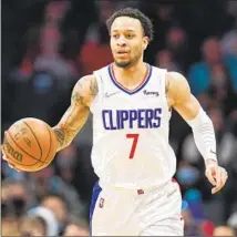  ?? Rusty Jones Associated Press ?? AMIR COFFEY, above, was the only Clipper to receive a qualifying offer from the team. Jay Scrubb and Xavier Moon did not.