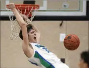  ?? D. ROSS CAMERON — SPECIAL TO THE MARIN INDEPENDEN­T JOURNAL ?? Branson guard George Gale (33) dunks against Pinole Valley during the second quarter of Friday’s North Coast Section Division III finals in San Rafael.