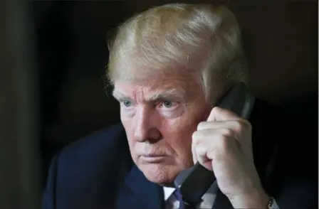  ?? SUSAN WALSH — THE ASSOCIATED PRESS ?? President Donald Trump talks with troops via teleconfer­ence from his Mar-a-Lago estate in Palm Beach, Fla., Thursday.
