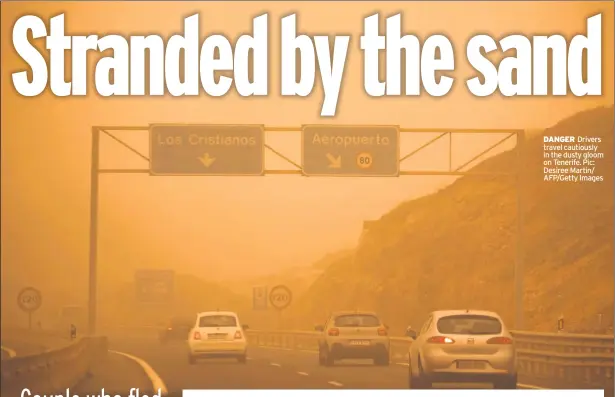  ??  ?? DANGER Drivers travel cautiously in the dusty gloom on Tenerife. Pic: Desiree Martin/ AFP/Getty Images