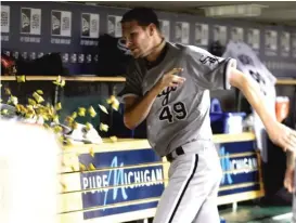  ?? | DUANE BURLESON/ AP ?? The temperamen­tal Sale sends gum flying in the dugout after giving up a three- run homer to the Tigers’ Delmon Young during a game in 2012.