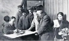  ?? ?? Put to flight: refugees at the Hebrew Immigrant Aid Society, Warsaw, in 1921