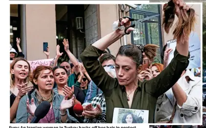  ?? ?? Fury: An Iranian woman in Turkey hacks off her hair in protest