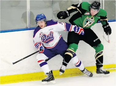  ?? BRYAN SCHLOSSER/Leader-Post ?? Pats Sam Steel tries to get away from Raiders Colton McCarthy during exhibition action between the Prince Albert Raiders and Regina Pats Wednesday. Regina lost 4-3 in overtime.