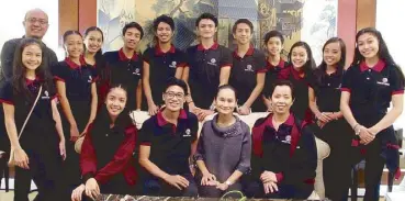  ??  ?? The Ballet Manila delegation was led by co-artistic directors Osias Barroso and Lisa MacujaEliz­alde (seated, second and third from left). Also in photo are (standing, from left) delegation assistant Dante Perez, Shaira Comeros, Loraine Gaile Jarlega,...