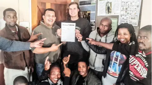  ?? Photo: Supplied ?? Rhodes University Business School Post Graduate Diploma in Enterprise Management (PDEM students), Darren Wolhuter and Dean Stephenson, sign up small businesses at the Assumption Developmen­t Centre (ADC) in Joza for their PDEM start-up,...