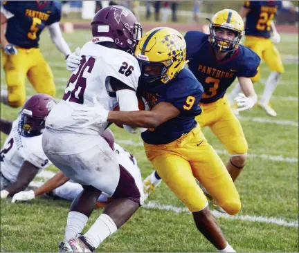  ?? OWEN MCCUE - MEDIANEWS GROU ?? Pope John Paul II’s Josh Little (9) tackles Pottsgrove’s Amir Brunson (26) on Saturday.