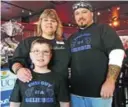  ??  ?? Holly Wickline, president of the Moms 4 Bieber fan club, her husband Gene Miller and son Whyatt, 9, of West Virginia.