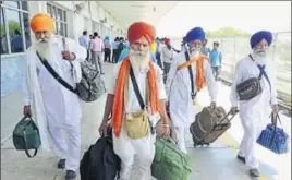  ?? SAMEER SEHGAL/HT ?? Sikh pilgrims returning from Pakistan after Baisakhi celebratio­ns, at the Attari railway station in Amritsar on Saturday.