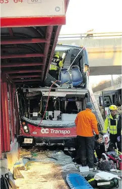  ?? LORENZO GAMBETTA / TWITTER ?? Police and first responders work at the scene where a city bus struck a transit shelter.