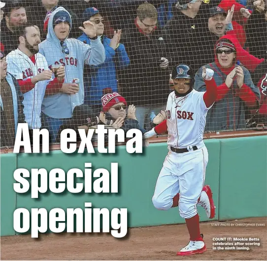  ?? STAFF PHOTO BY CHRISTOPHE­R EVANS ?? COUNT IT: Mookie Betts celebrates after scoring in the ninth inning.
