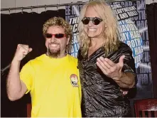  ?? Associated Press file photo ?? David Lee Roth, right, and Sammy Hagar announce a concert tour in 2002. Whether the rival will join forces again is unclear.