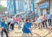  ?? PTI FILE ?? Activists of two political parties clash during filing of panchayat polls nomination in Burdwan.