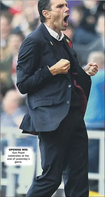  ??  ?? OPENING WIN:
Gus Poyet celebrates at the end of yesterday’s
game.