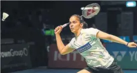  ?? GETTY IMAGES ?? Saina Nehwal took just over 35 minutes to tame her rival and stay in contention for the title.