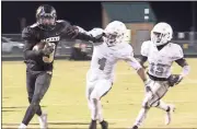  ?? Kevin Myrick / SJ ?? Rockmart’s Juke Boozer pushes against Callaway’s Kobe Jackson as he runs out of bounds with a pass.