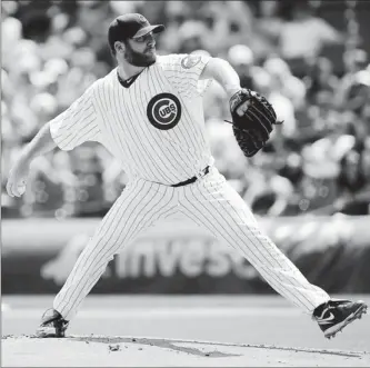  ?? By Jerry Lai, US Presswire ?? On the move?
Cubs ace Ryan Dempster, pitching Saturday, has baseball’s best ERA and could be a boost for a playoff contender. If he is traded, Dempster says he wouldn’t rule out a return to the Cubs after the season.