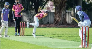  ??  ?? Ibby Wahid steams in to bowl during the under 14 clash between Drouin and Western Park White.