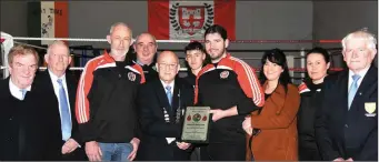  ??  ?? Group pictured at the presentati­on of a plaque by the Cork Ex Boxers Associatio­n to the Charlevill­e Boxing Club in recognitio­n of their fantastic success in Cork County in 2017. Included are J. J.Murphy, Michael O’Brien, Brendan O’Donovan, Chairman...