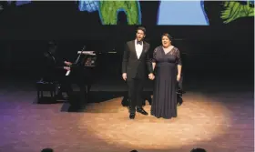  ?? Matthew Washburn / San Francisco Opera ?? Bass-baritone Christian Pursell and soprano Felicia Moore, accompanie­d by pianist César Cañón, perform Brahms’ “Die schöne Magelone” song cycle.