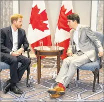  ?? CHRIS YOUNG/THE CANADIAN PRESS ?? Prince Harry, left, meets with Canadian Prime Minister Justin Trudeau in Toronto on Saturday, Sept. 23.