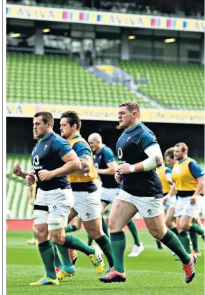  ??  ?? Backed to the hilt: Tadhg Furlong (right) and the rest of the Ireland team are centrally contracted and not allowed to play too many games each season
