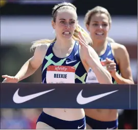  ??  ?? Jemma Reekie crosses the line to seal her personal best in the 800m at the USATF Golden Games on Sunday