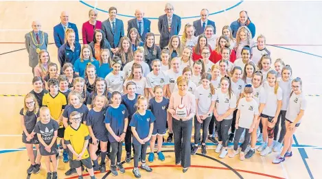  ?? Pictures: Steve MacDougall ?? First Minister Nicola Sturgeon with netball players from local schools, including St Peter and Paul’s RC Primary, Clepington Primary and Grove Academy, at the Regional Performanc­e Centre.