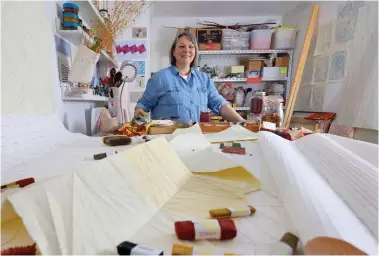  ?? Photograph: Colin Hattersley ?? Charlene Scott in her studio at home with some of her work