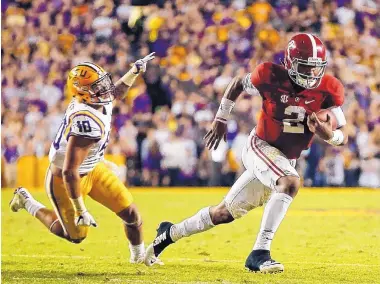  ?? AP FILE ?? The last time Alabama played LSU in Baton Rouge it was Crimson Tide QB Jalen Hurts (2) leading the way in a 10-0 victory. Hurts now is a backup to Heisman Trophy front-runner Tua Tagovailoa.