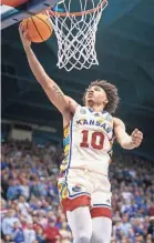  ?? WILLIAM PURNELL/USA TODAY SPORTS ?? Kansas forward Jalen Wilson puts up a shot against Baylor on Saturday night in Lawrence, Kansas.