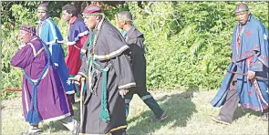  ?? ?? While hundreds of members of the Red Gown Sect Church boarded kombis and cars from the vigil venue to the Indian Ocean, which is about 2km away, others, who were in high spirit, decided to walk.