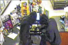  ?? Colonie Police ?? Colonie police released this photo as part of their probe of an armed robbery of an Albany Shaker Road gas station.