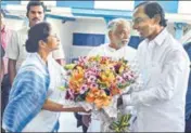  ?? PTI ?? West Bengal chief minister Mamata Banerjee greets her Telangana counterpar­t K Chandrashe­khar Rao in Kolkata on Monday.