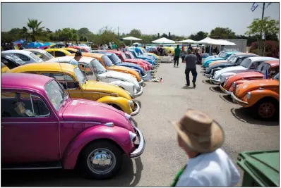  ?? AP ?? Over decades of production, the Volkswagen Beetle has remained a recognizab­le model, with vintage cars displayed at events such as this gathering of the “Beetle club” in Yakum, Israel.