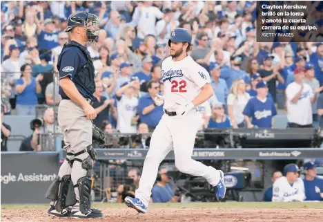  ?? /GETTY IMAGES ?? Clayton Kershaw brilló en la loma y anotó la cuarta carrera de su equipo.