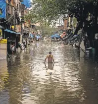  ??  ?? This year, India experience­d its wettest September in a century; more than 1,600 people were killed in the flooding. A neighborho­od in Mumbai in August.