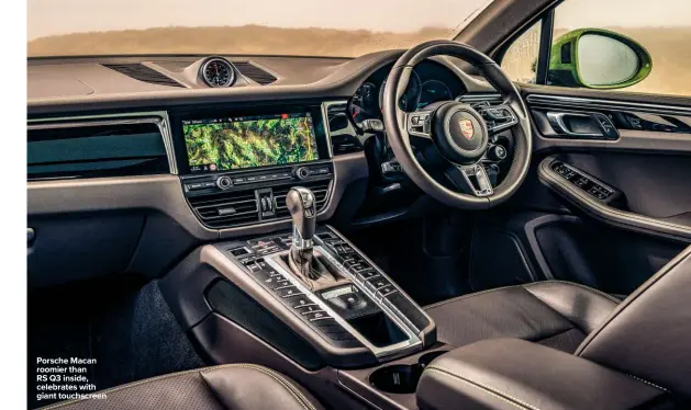  ??  ?? Porsche Macan roomier than RS Q3 inside, celebrates with giant touchscree­n
