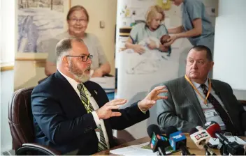  ?? BRANDON HARDER ?? Saskatchew­an Health Authority CEO Scott Livingston­e and SHA board chairperso­n Dick Carter speak to reporters in Regina on Tuesday during a review of the authority’s first year of operation.