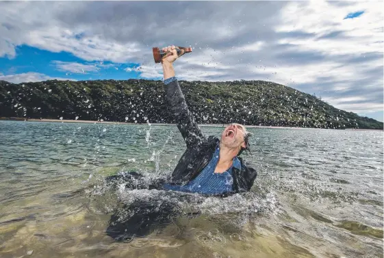  ?? Picture: JERAD WILLIAMS ?? Actor Gavin Webber takes the Helpmann Award for a swim in Tallebudge­ra Creek. It was won by the Bleach* Festival and contempora­ry dance company The Farm for their water-based production Tide.